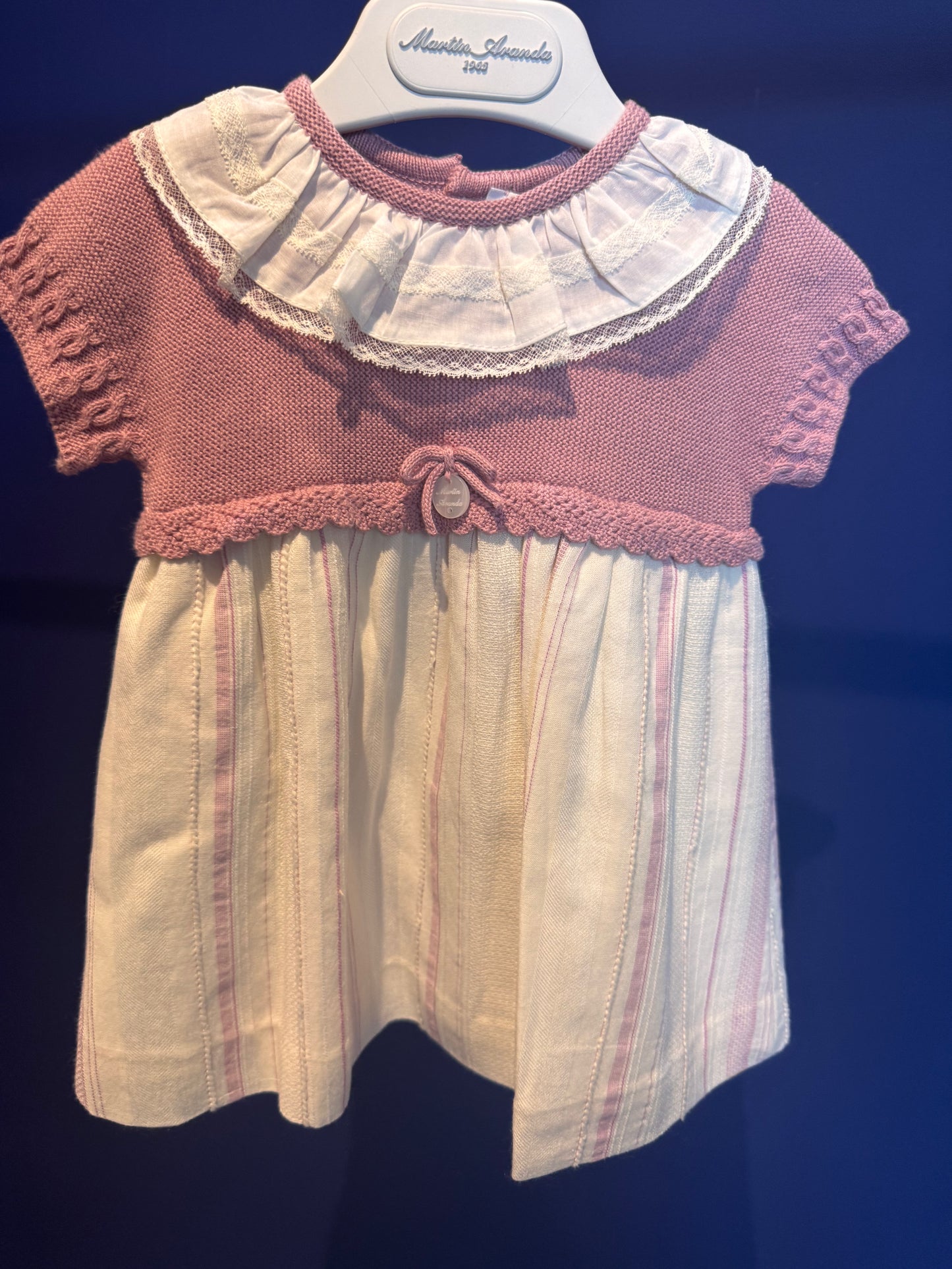 Vestido punto y tela rosa fuerte rayas.
